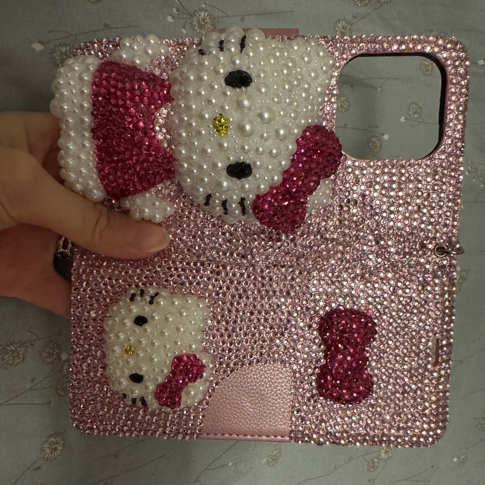 Handmade iPhone 15 pro rhinestone hello kitty flip phone case